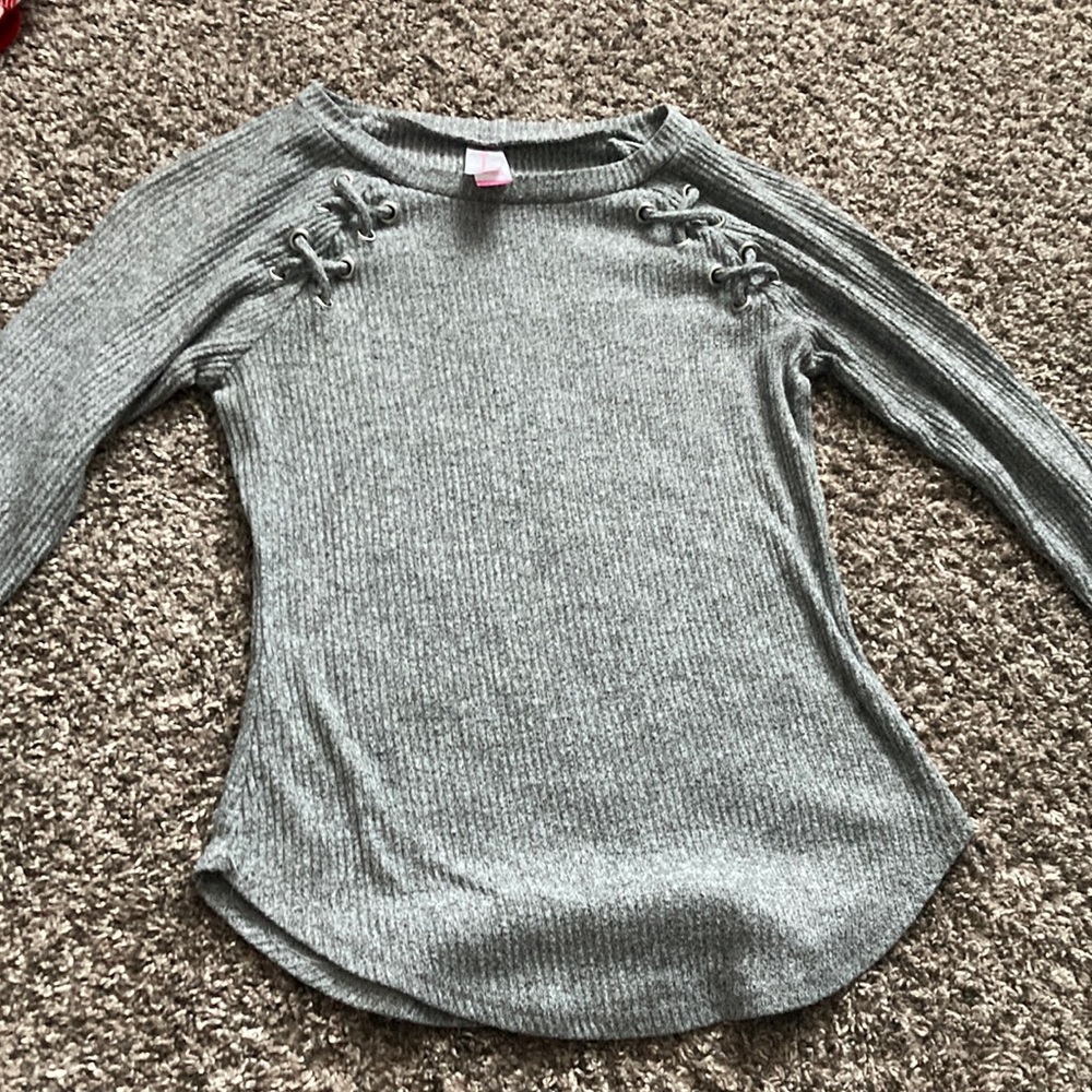 Cute shirt. Worn multiple times but in good shape.